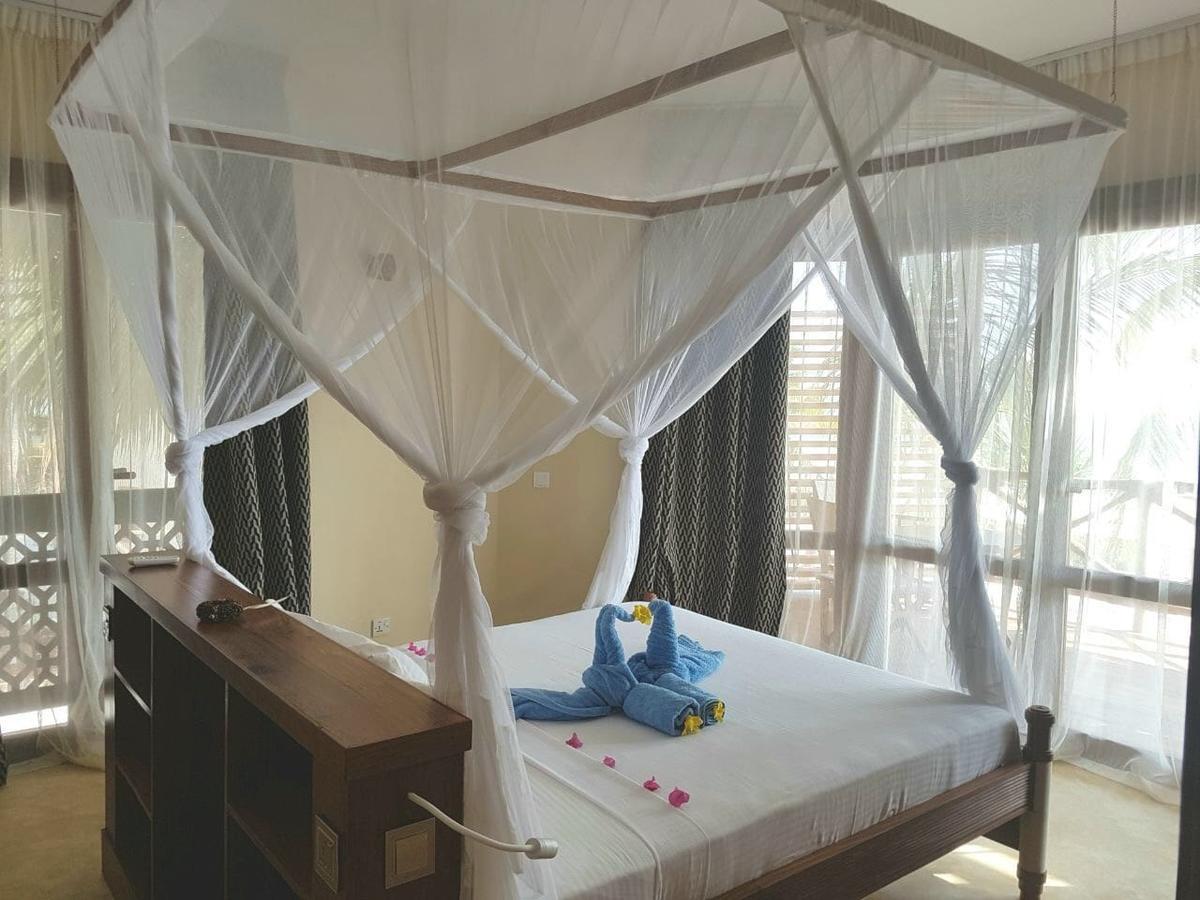 Kamer met Queensize Bed en Uitzicht op Zee